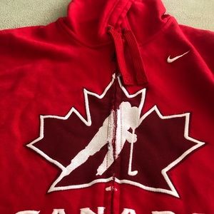 New never worn with tags Nike team Canada genuine red distressed style hoodie